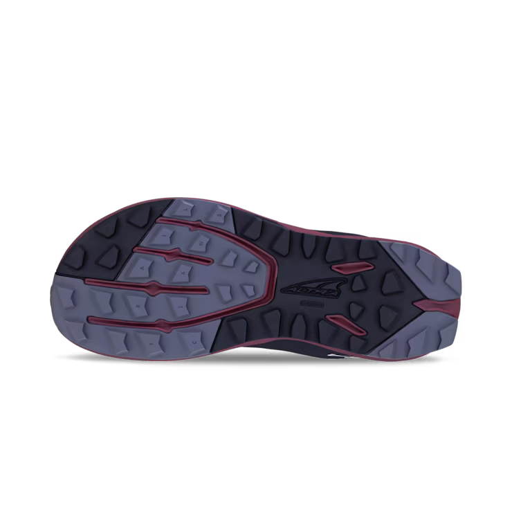 Dark blue Altra Women's Superior 7 trail shoe outsole with black and red grip pattern.