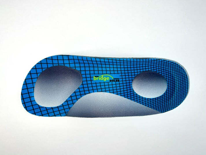 Blue 3/4 length insole with metatarsal pad and grid pattern, labeled Bridge Soles.
