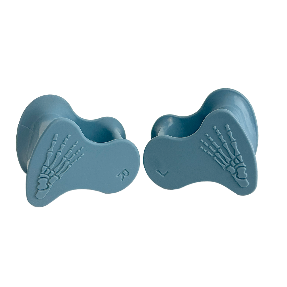 Blue silicone toe spacers with skeletal foot bone design, labeled L and R.
