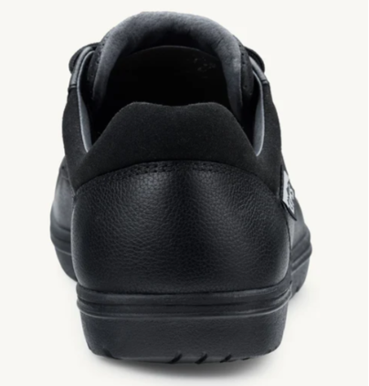 Black low-top casual shoe with textured heel and padded ankle collar.
