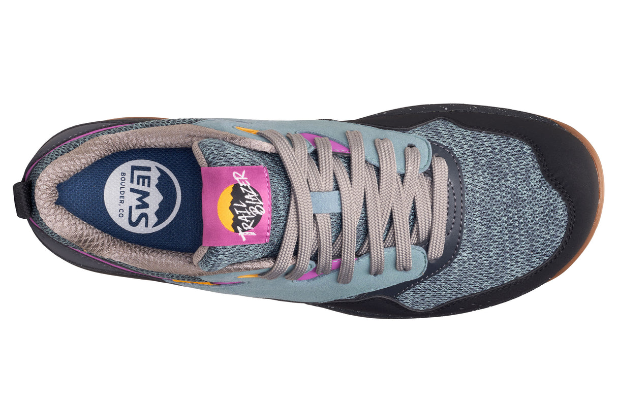 Top view of Lems Trail Blazer sneaker in gray with pink and blue accents and round laces.