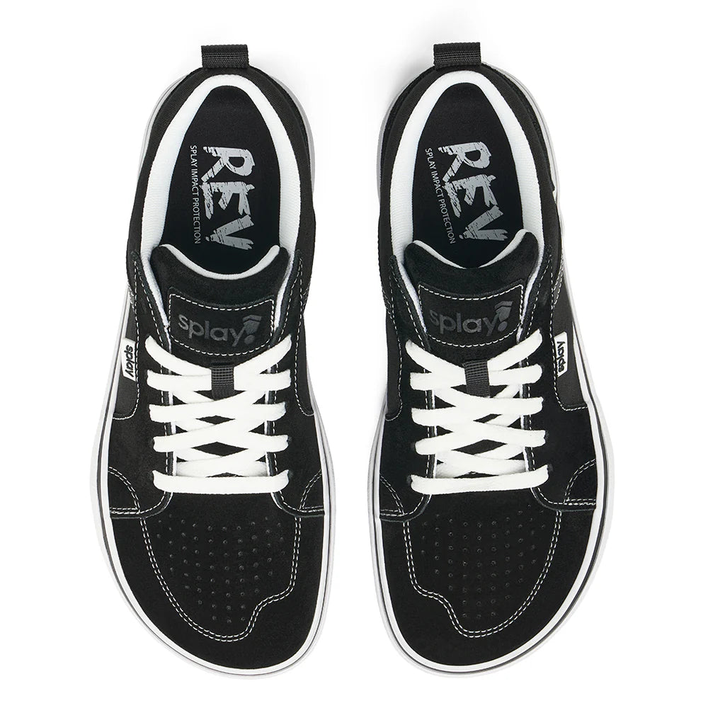 Black sneakers with white laces on a white background
