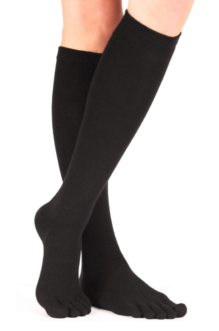 Black knee-high toe socks with individual toe compartments, worn on legs against a white background.