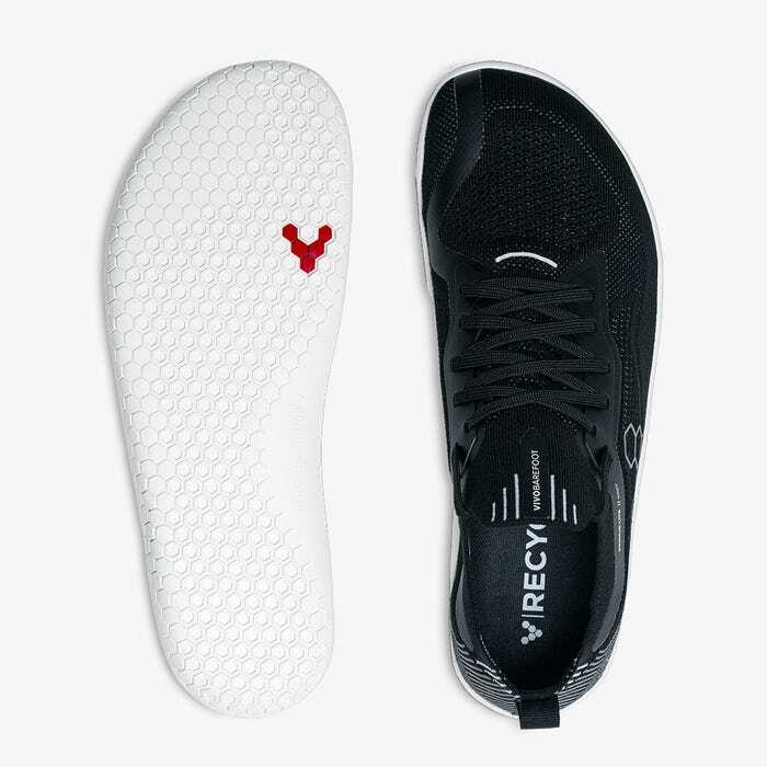 Black knitted Vivobarefoot Primus Lite sneaker with white sole and minimalist design.