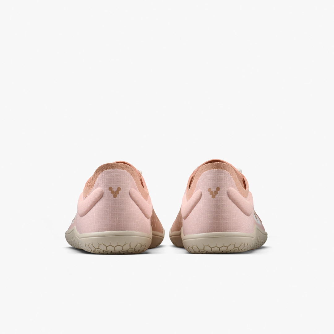 Pair of pink shoes with a brand logo on a white background