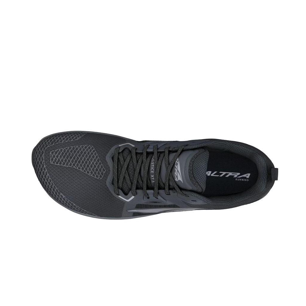 Black Altra women's Solstice XT3 athletic shoe with mesh upper and padded collar, top view.