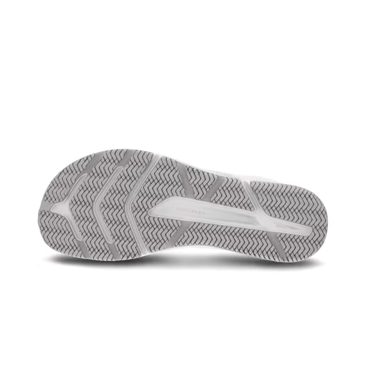 White Altra Solstice XT3 athletic shoe outsole with textured traction pattern.
