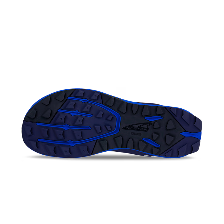 Dark blue athletic shoe sole with deep tread and black traction patterns.