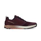 Dark purple women's athletic shoe with white sole, orange tread, and black laces.
