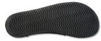 Grey slip-on sneaker with textured wavy rubber sole for traction and flexibility.