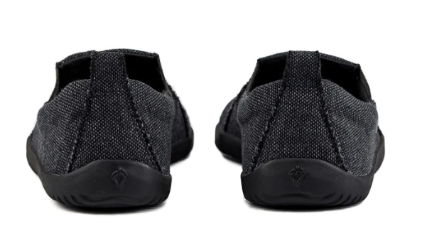 Grey recycled fabric slip-on sneakers with black rubber soles shown from the back.