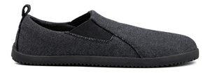 Grey slip-on sneakers with black elastic side panels and textured black soles.