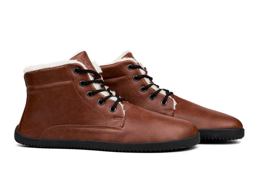 Brown leather ankle boots with black laces and black rubber soles, lined with white fleece.