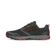 Black and gray athletic running shoe with red accents and cushioned sole.