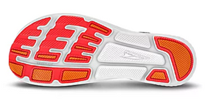 Black and white Altra Escalante Racer 2 outsole with red and orange traction pads.