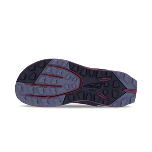 Dark blue Altra Women's Superior 7 trail shoe outsole with black and red grip pattern.