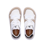 White and beige casual sneakers with white laces and cushioned soles viewed from above.