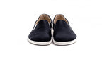 Black slip-on casual shoes with white soles and rounded toes, smooth leather upper.