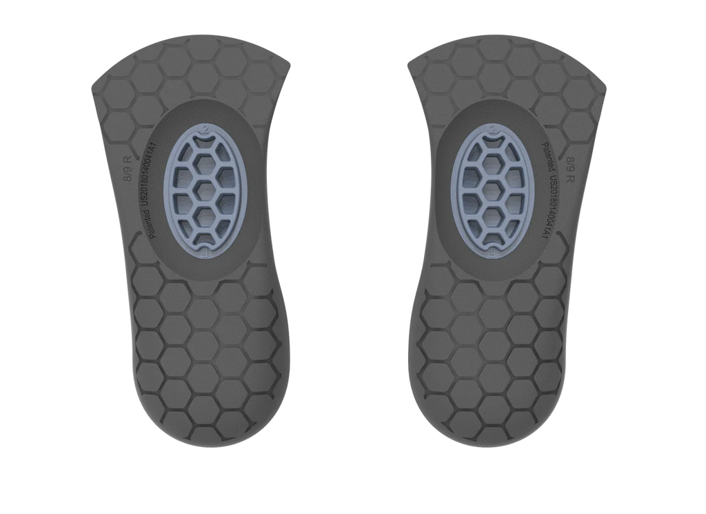 Pair of black and gray Biopods Next Generation 3/4-length Stimsoles insoles with honeycomb texture and central cushioning.