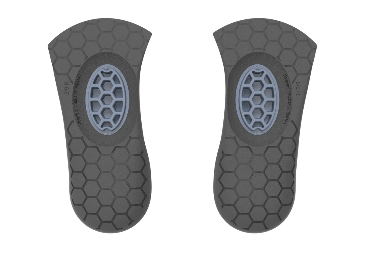 Pair of black and gray Biopods Next Generation 3/4-length Stimsoles insoles with honeycomb texture and central cushioning.
