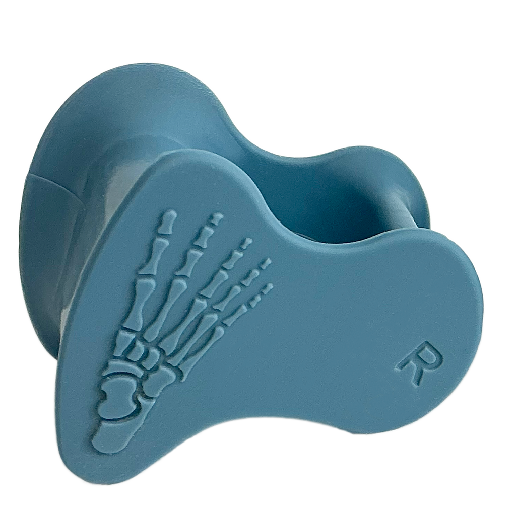 Blue silicone toe spacer with skeletal foot design and right foot indicator "R" embossed.