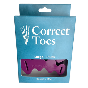 Plum-colored Correct Toes toe spacers in large size with blue retail packaging.