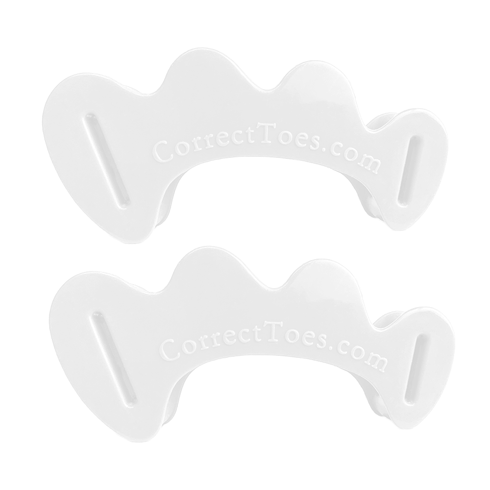 Clear Correct Toes Original toe spacers with curved design and slot openings, pair shown.
