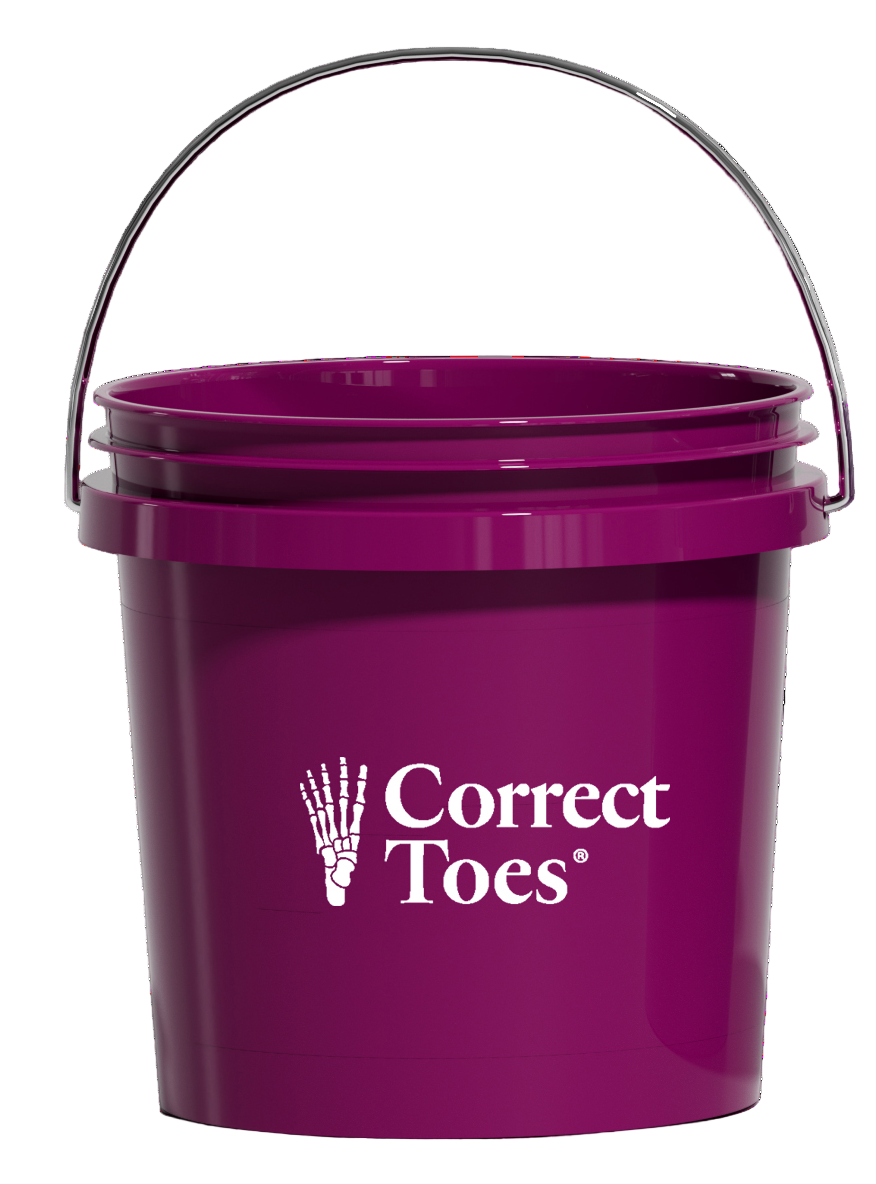 Purple plastic bucket with metal handle and white Correct Toes logo on front.