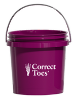 Purple plastic bucket with metal handle and white Correct Toes logo on front.