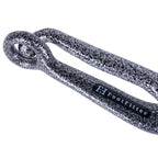 Speckled black cast iron FootFitter bunion stretcher with looped end and rectangular slot.
