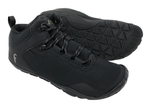 Black low-top athletic shoes with textured rubber soles and lace-up closure.