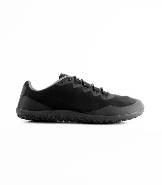 Black low-top sneaker with textured sole and lace-up front, sleek minimalist design.