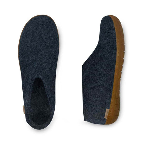 Dark blue felt slip-on shoe with honey-colored rubber sole and rounded toe.