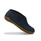 Dark blue felt slip-on shoe with textured honey-colored rubber sole.