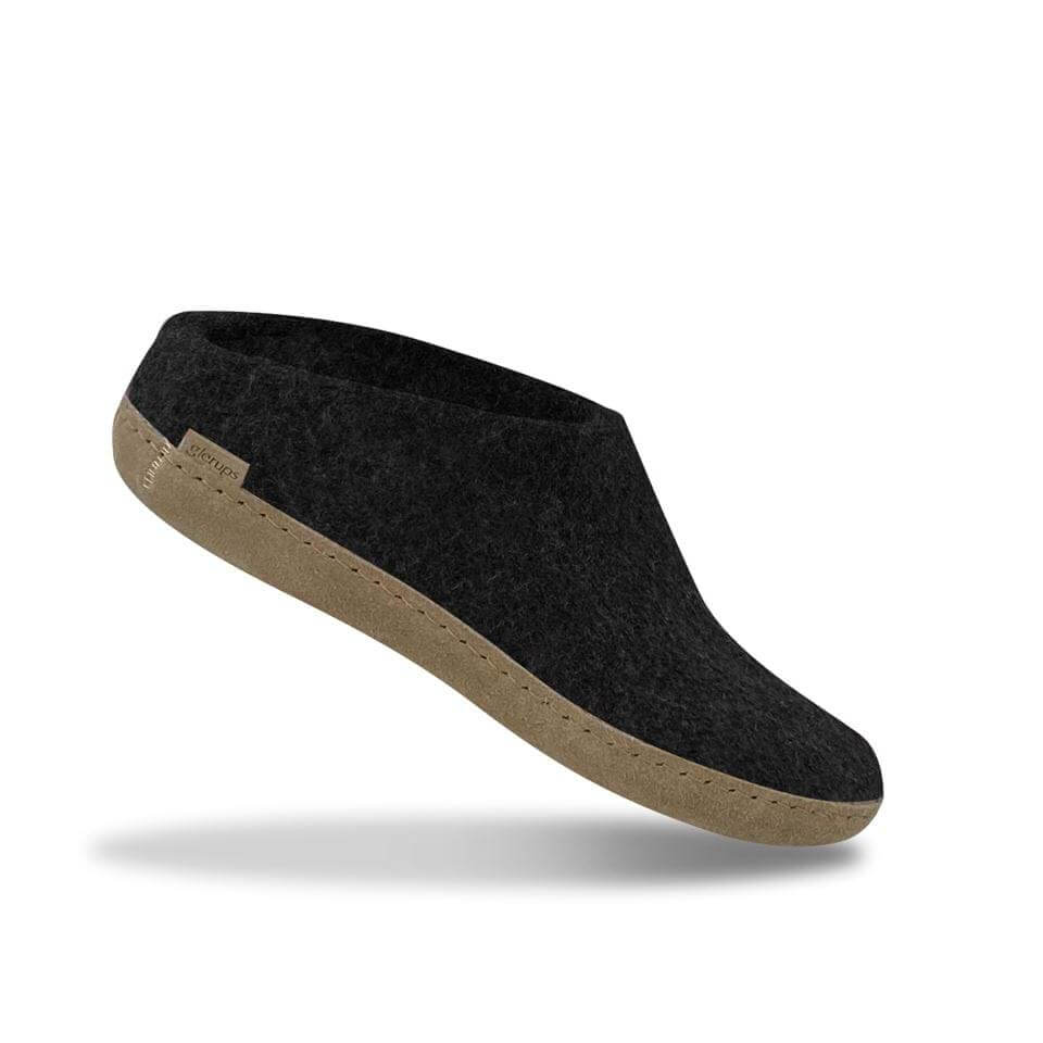 Charcoal gray slip-on slipper with textured leather sole and rounded toe.