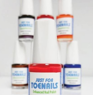 Bright red JustForToenails antifungal nail polish bottle with white cap and label, surrounded by assorted colors in the.
