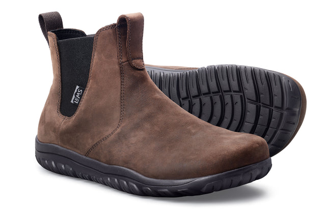 Brown waterproof leather Chelsea boots with black elastic side panels and durable rubber soles.