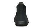 Black waterproof Chelsea boot with smooth matte finish and thick rubber sole, rear pull tab visible.