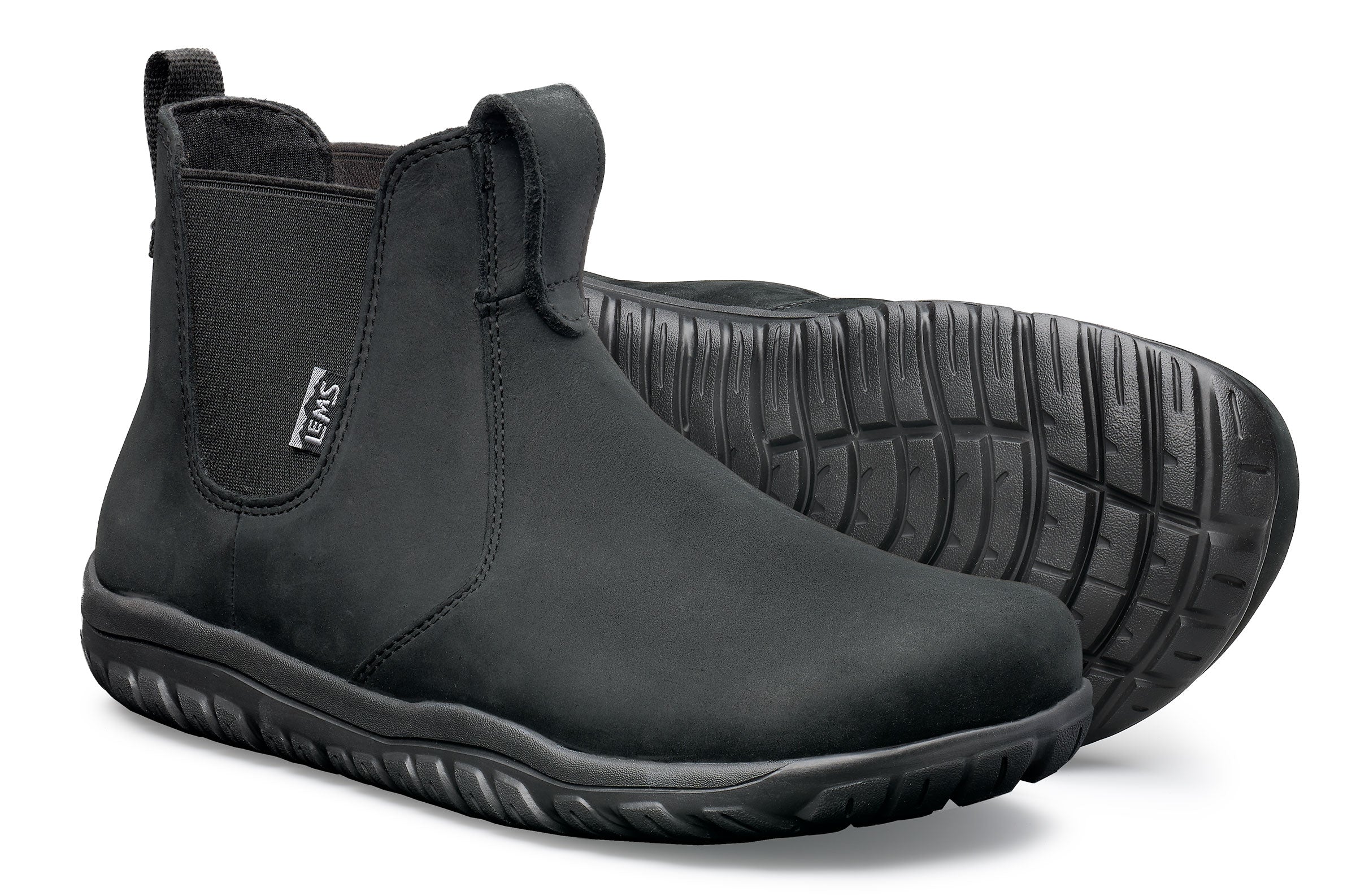 Black waterproof Chelsea boots with elastic side panels and textured rubber soles.