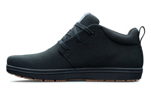 Blackout canvas Lems Chukka Grip shoe with minimalist lace-up design and rubber sole profile.
