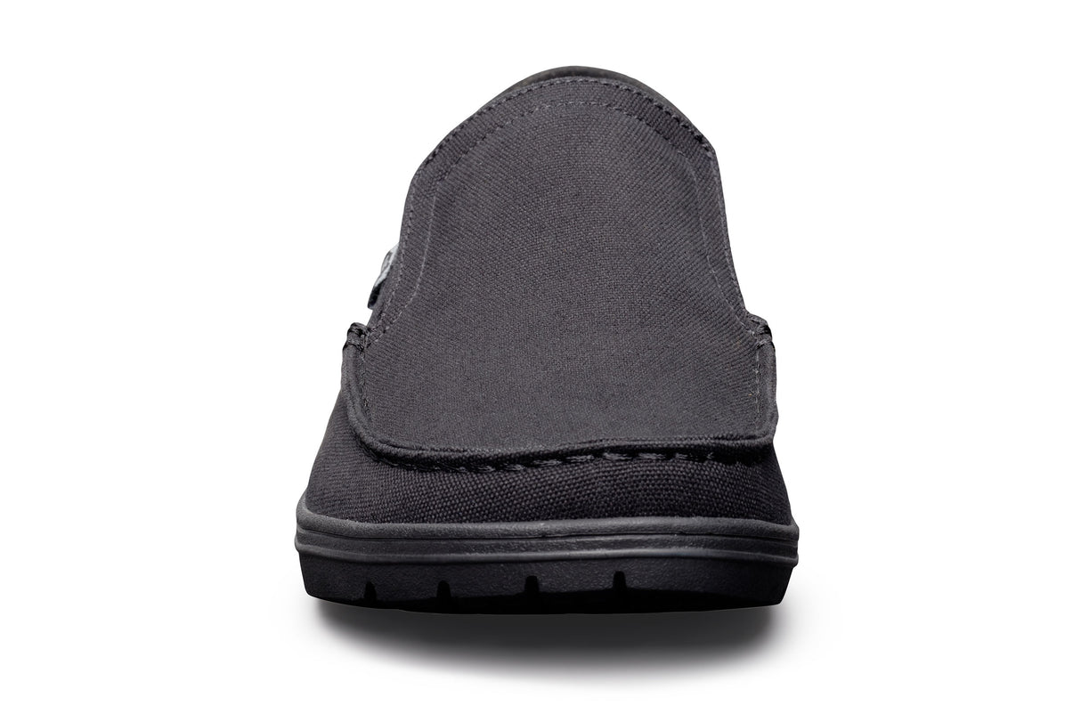 Dark gray slip-on casual shoe with rounded toe and thick sole.