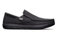 Black slip-on casual shoe with minimalist design and textured sole, Lems Drifter style.