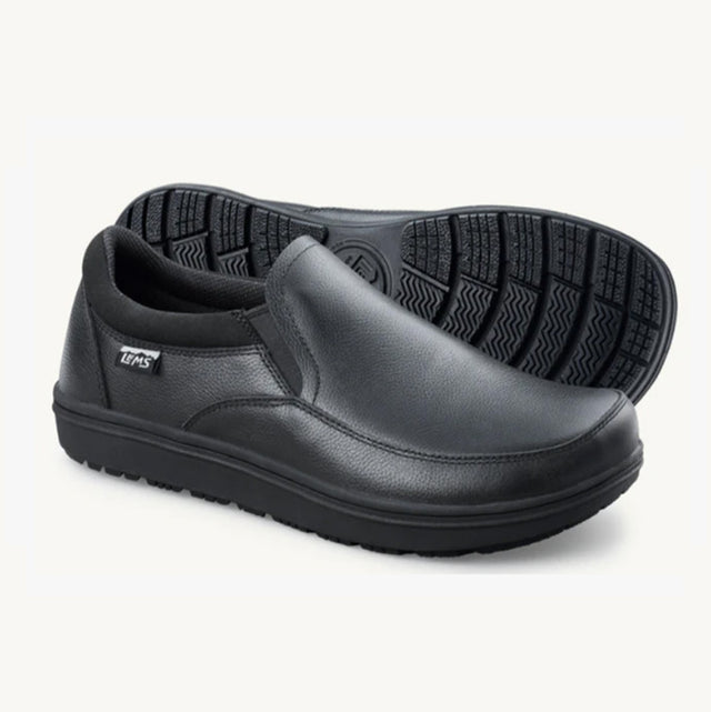 Black slip-on casual shoe with smooth synthetic upper and flexible textured sole.