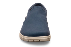 Navy slip-on casual shoe with beige rubber sole and rounded toe.
