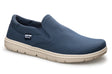 Navy blue slip-on canvas shoe with beige rubber sole and Lems logo tag on side.