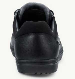 Black low-top casual shoe with textured heel and padded ankle collar.