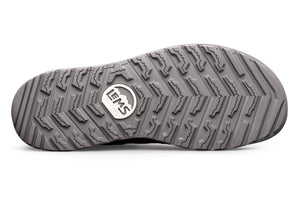 Gray rubber outsole with deep multi-directional tread pattern and Lems logo in center.