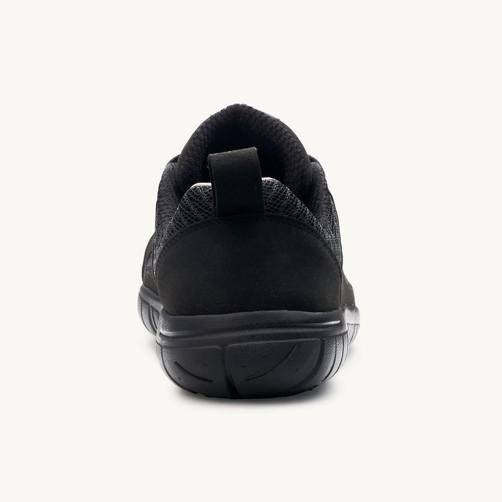 Black athletic sneaker with textured upper and pull tab on padded heel collar.