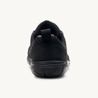 Black athletic sneaker with textured upper and pull tab on padded heel collar.