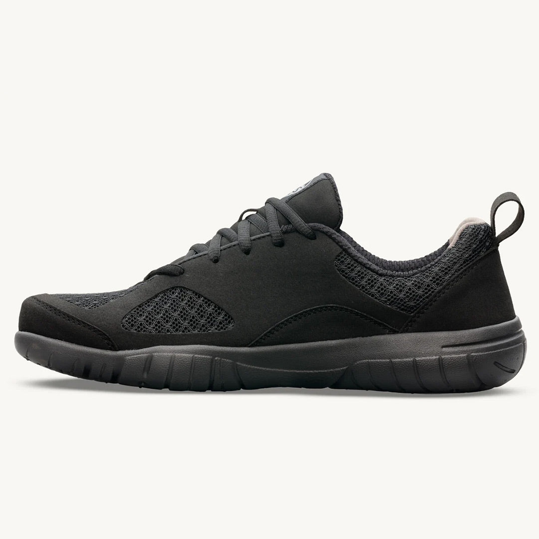 Black athletic sneaker with mesh panels, padded collar, and flexible sole.